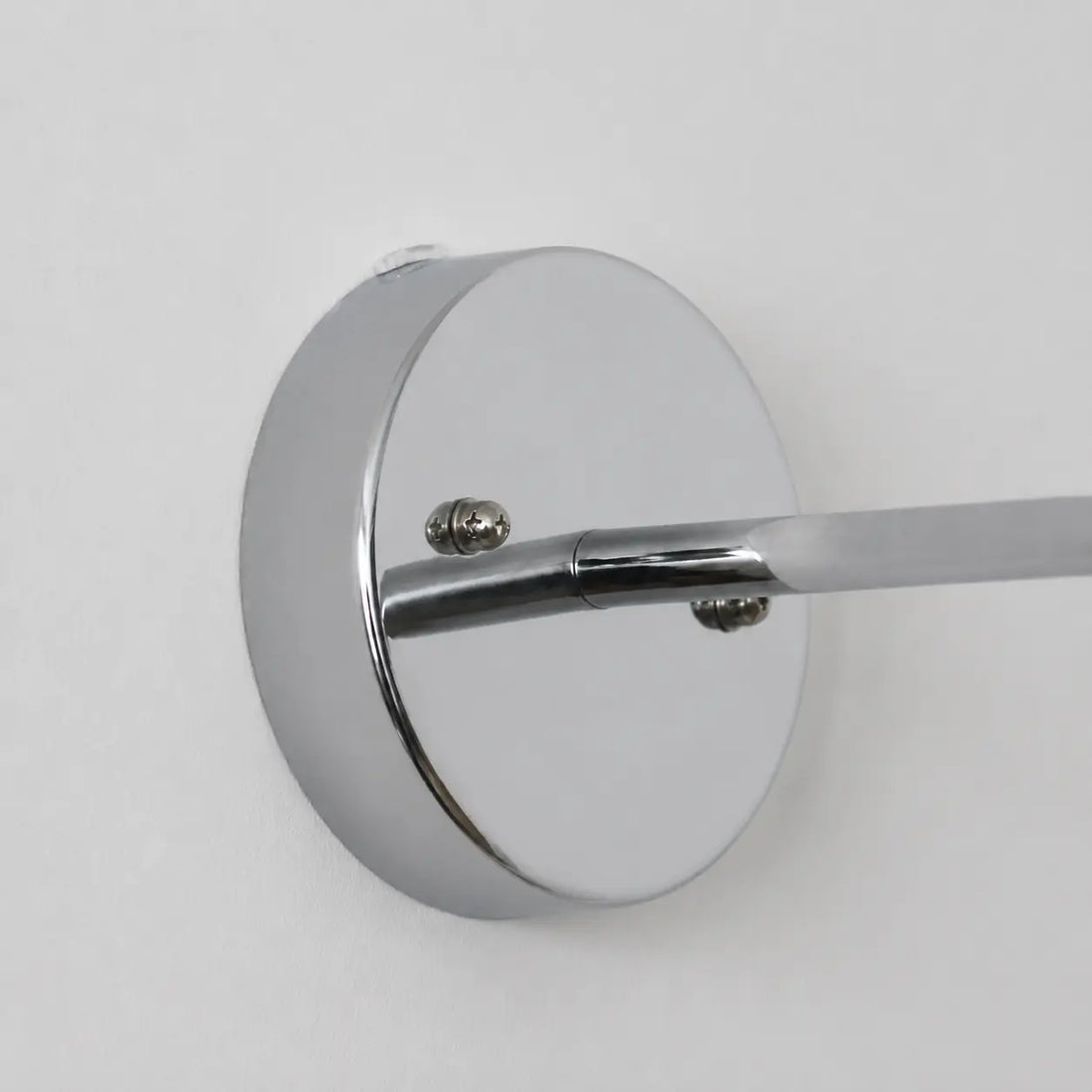 Wall plate and arm connection detail