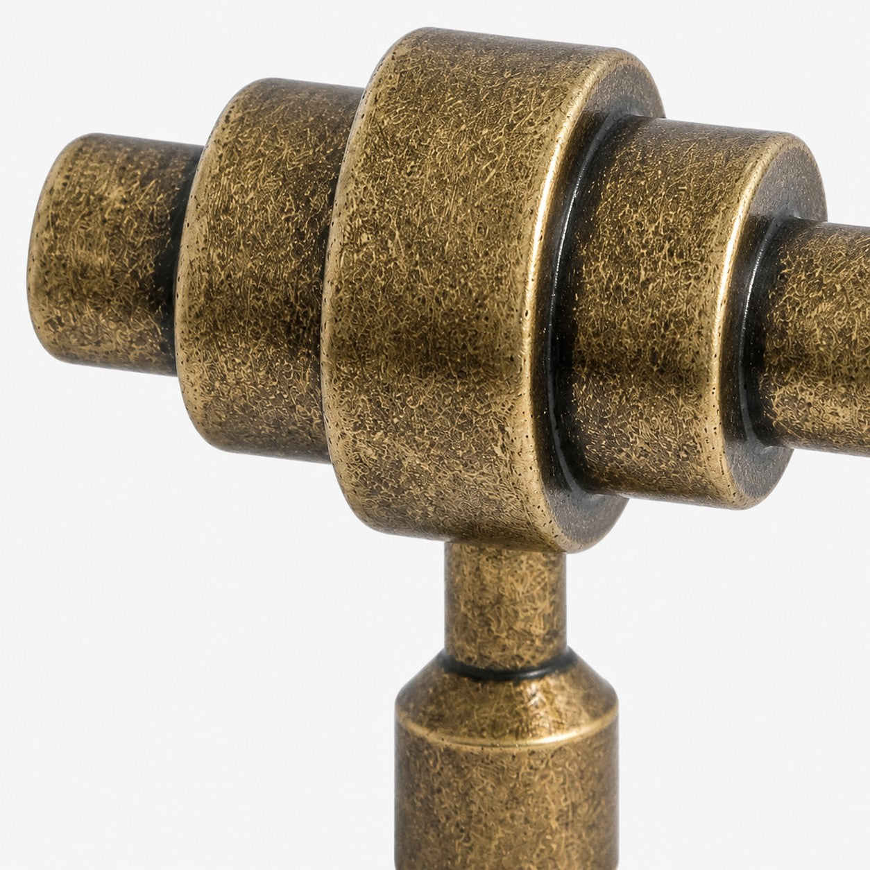 Stepped solid brass form and antique textured finish