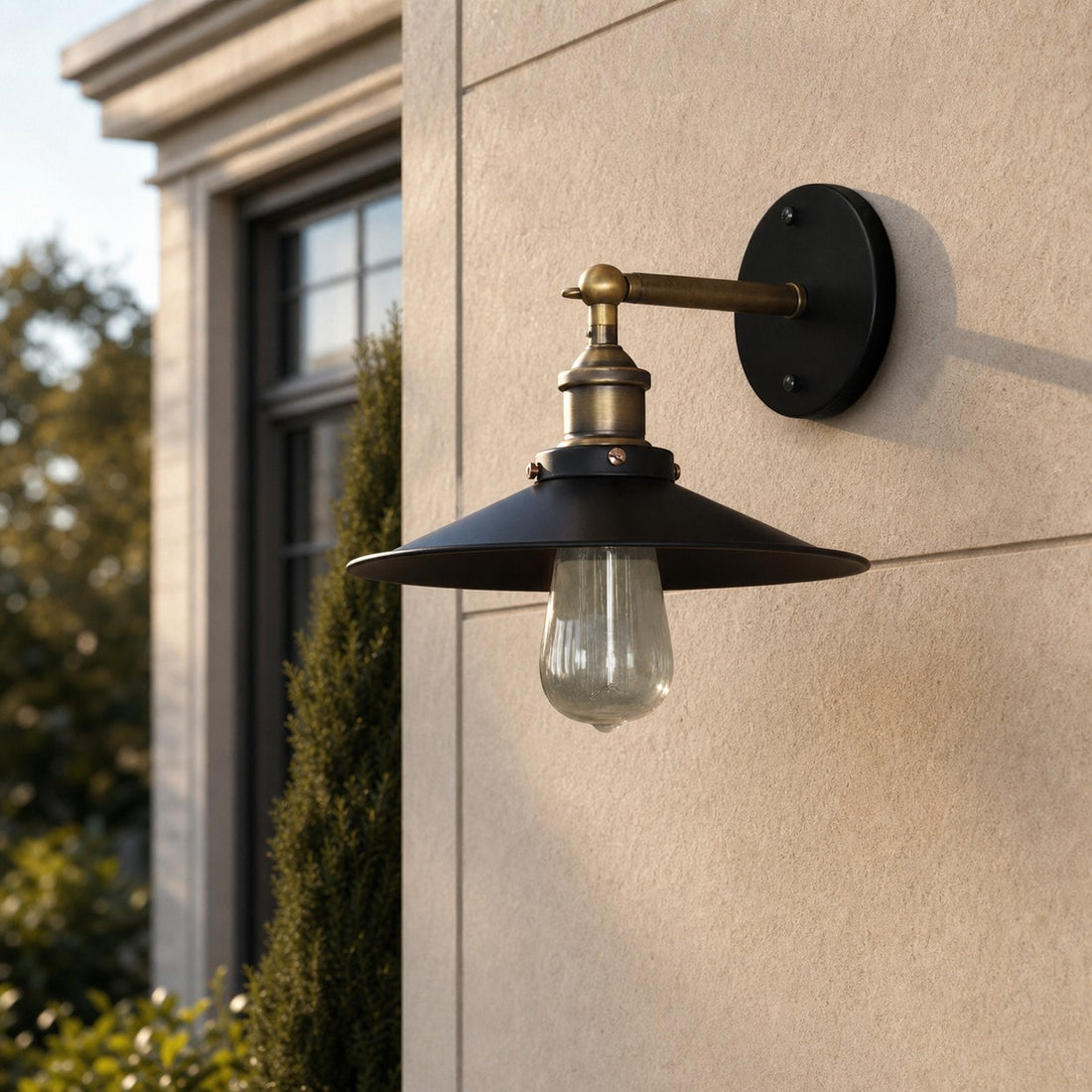 Outdoor wall lamp installed on exterior wall in daylight
