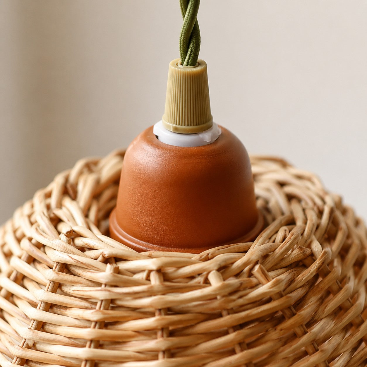 Pendant lamp top fitting and woven rattan shade detail