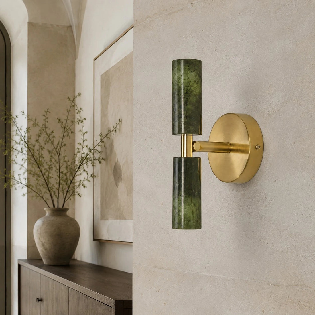 Natural green jade wall sconce installed in a hallway setting