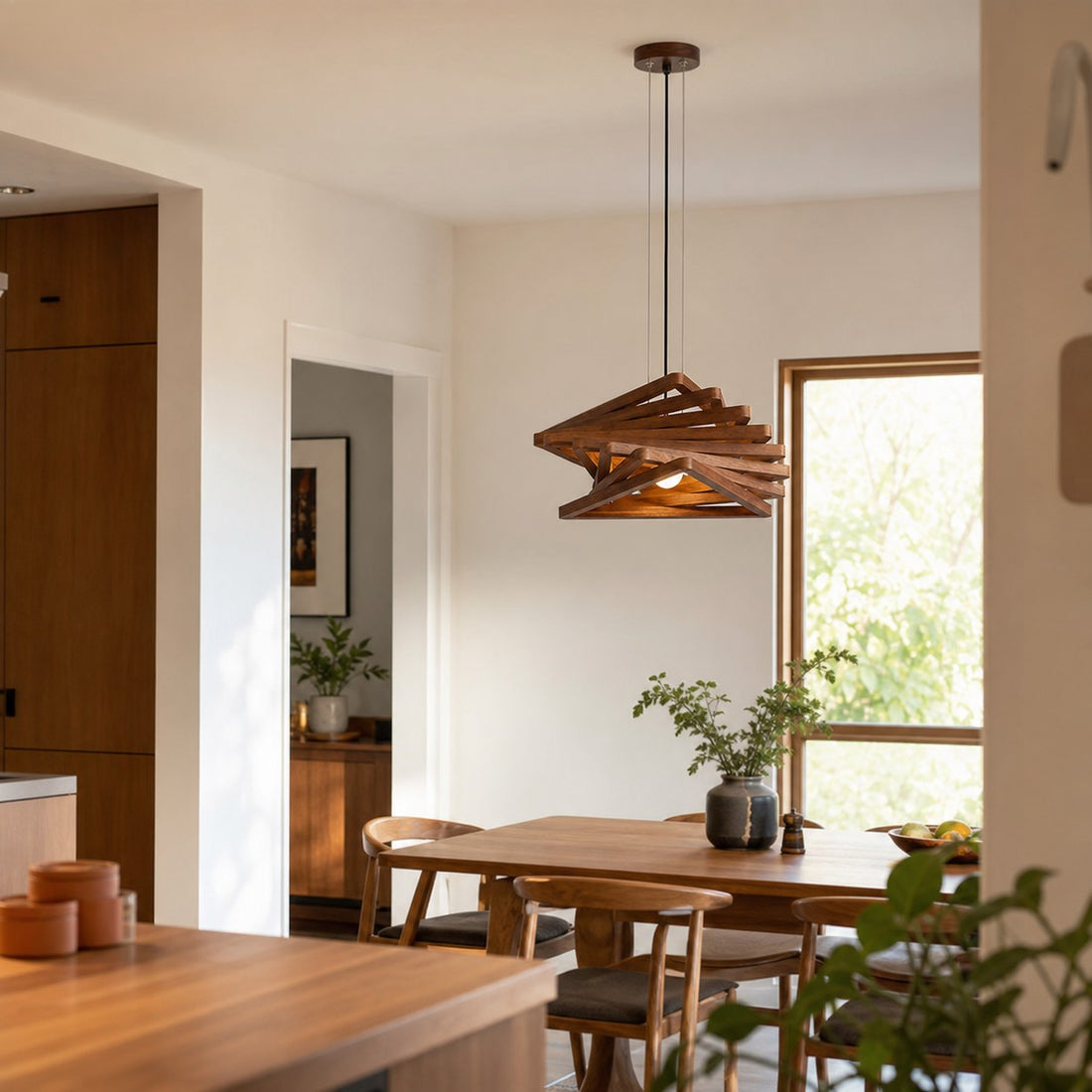 Walnut wood pendant light near kitchen and dining area