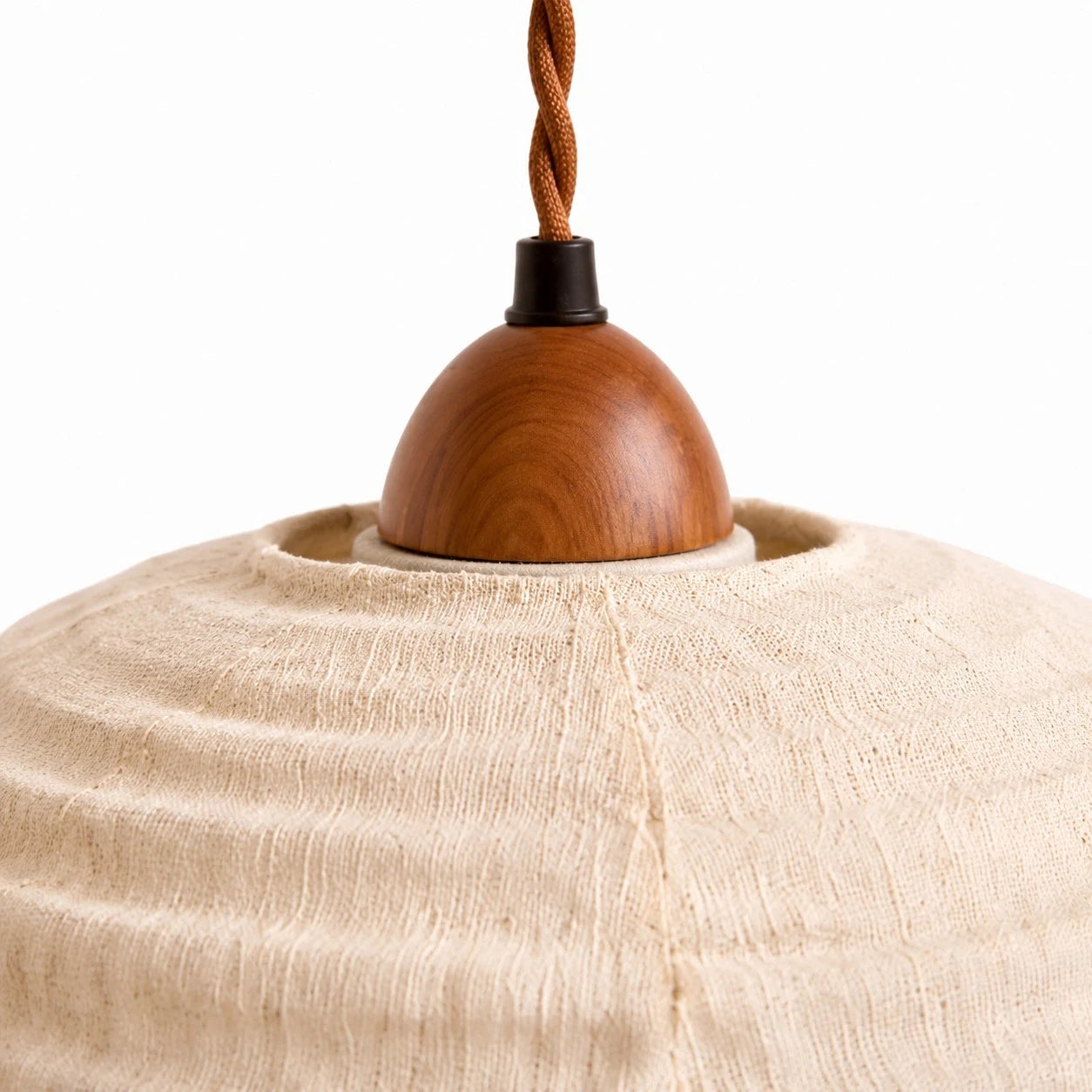Close view of the wood top detail and braided cord