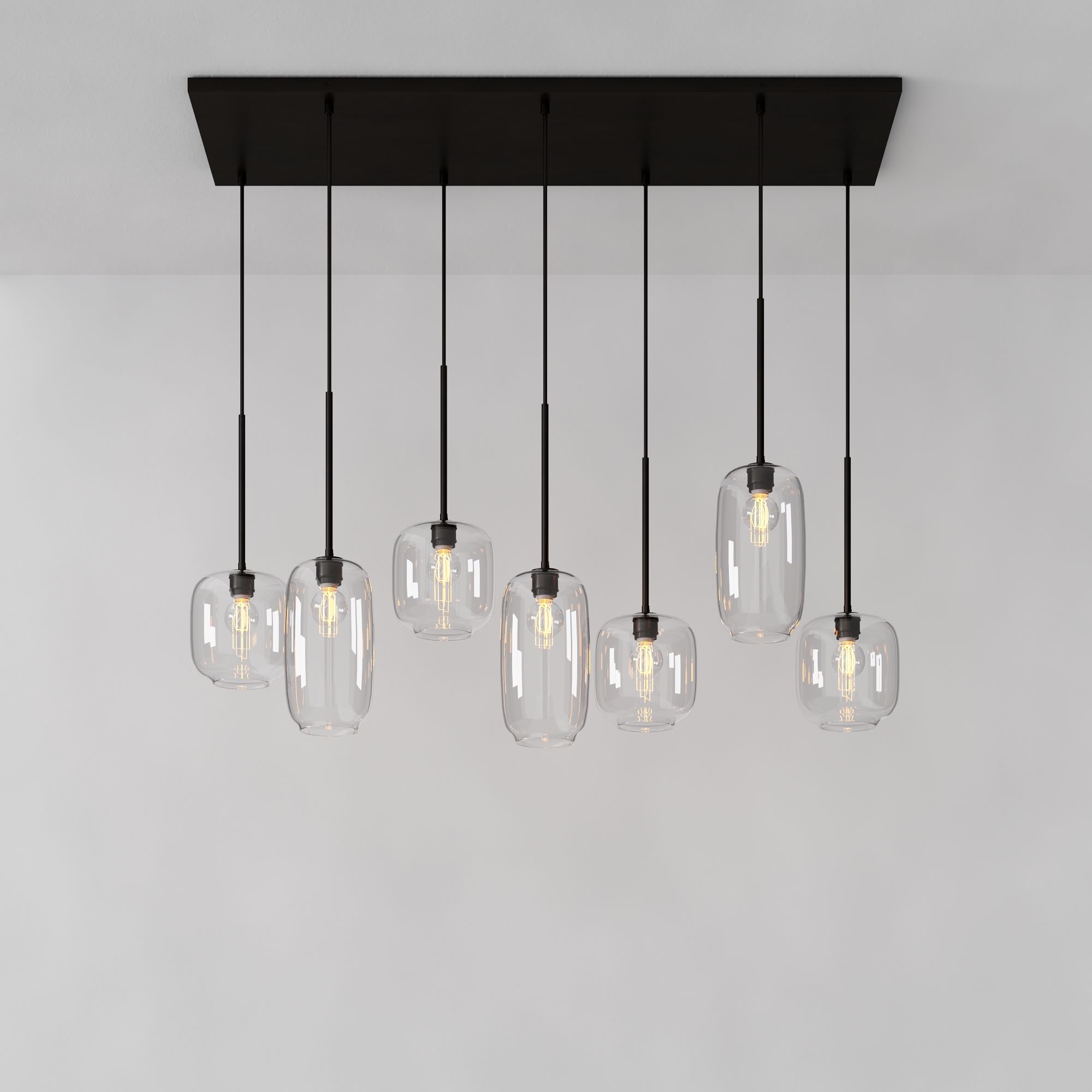 Lumivelle Sculptural 7-Light Chandelier – Adjustable Height Modern Glass Pendant