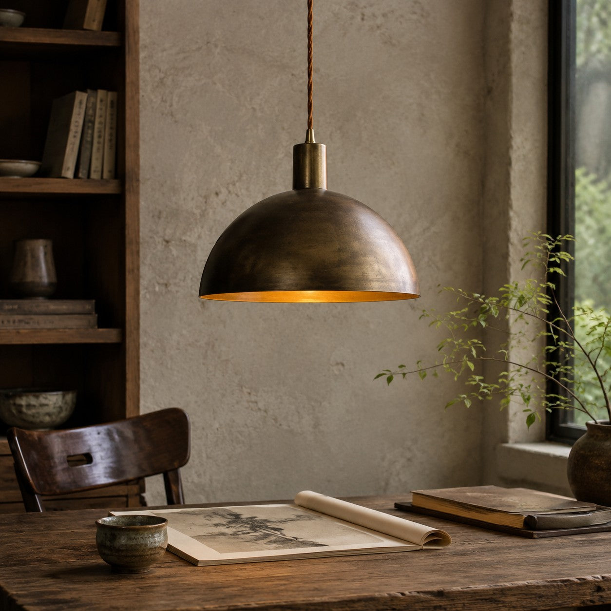 Close view of brushed brass dome shade finish