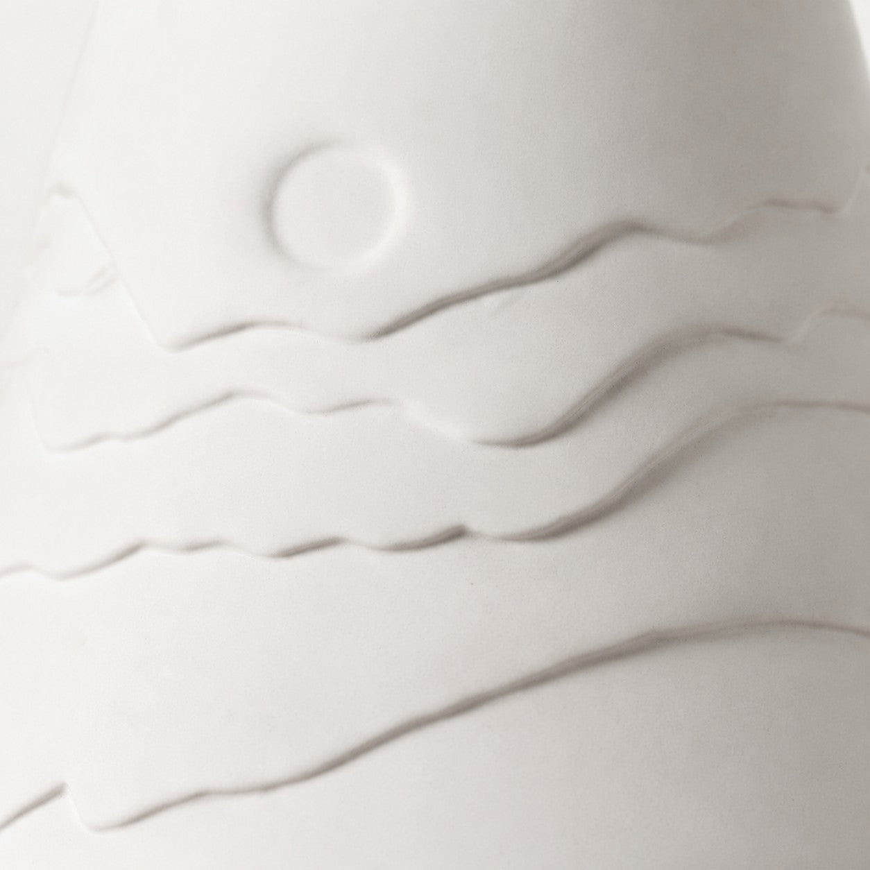Close view of the sculpted ceramic surface
