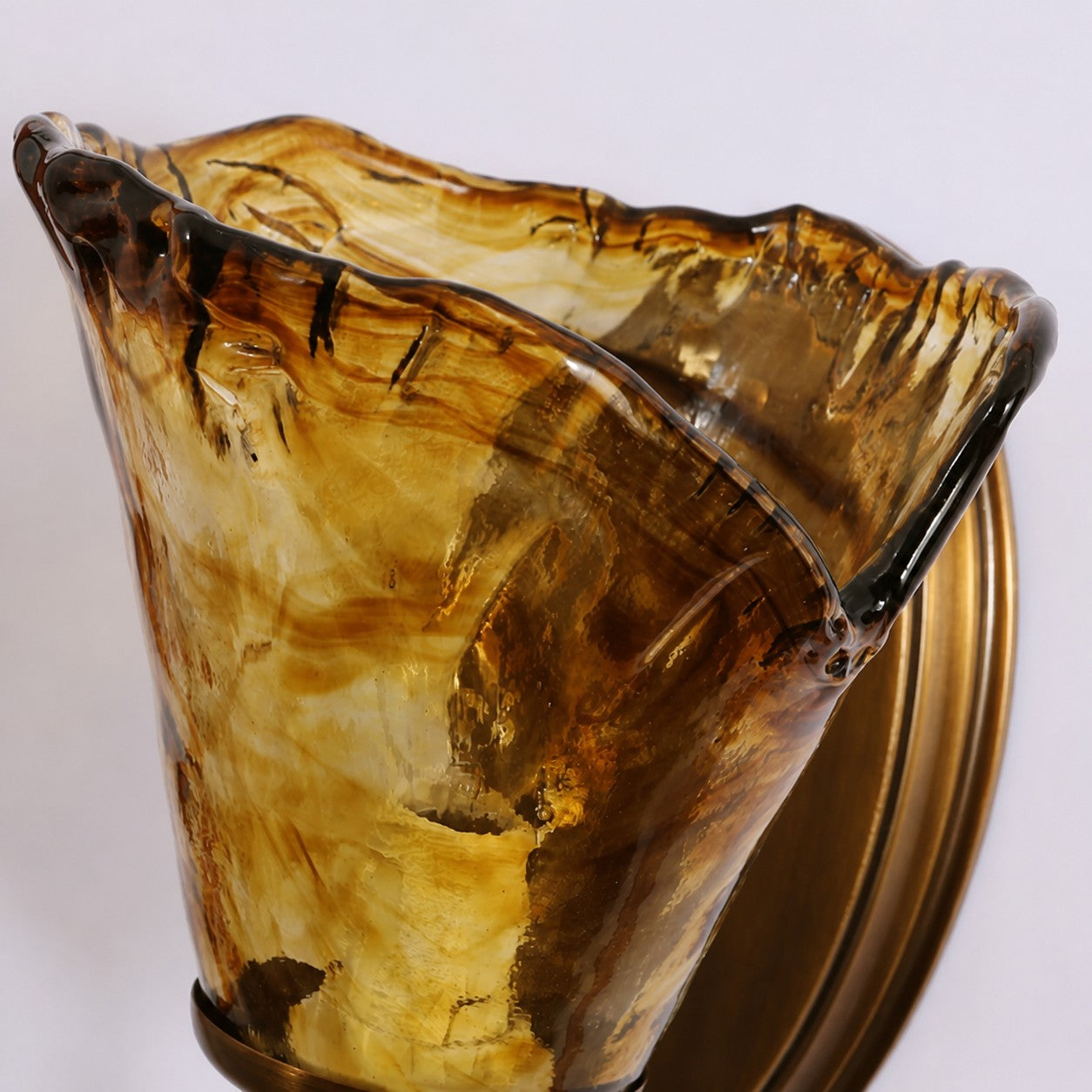 Sculpted Amber Glass and Brass Wall Sconce