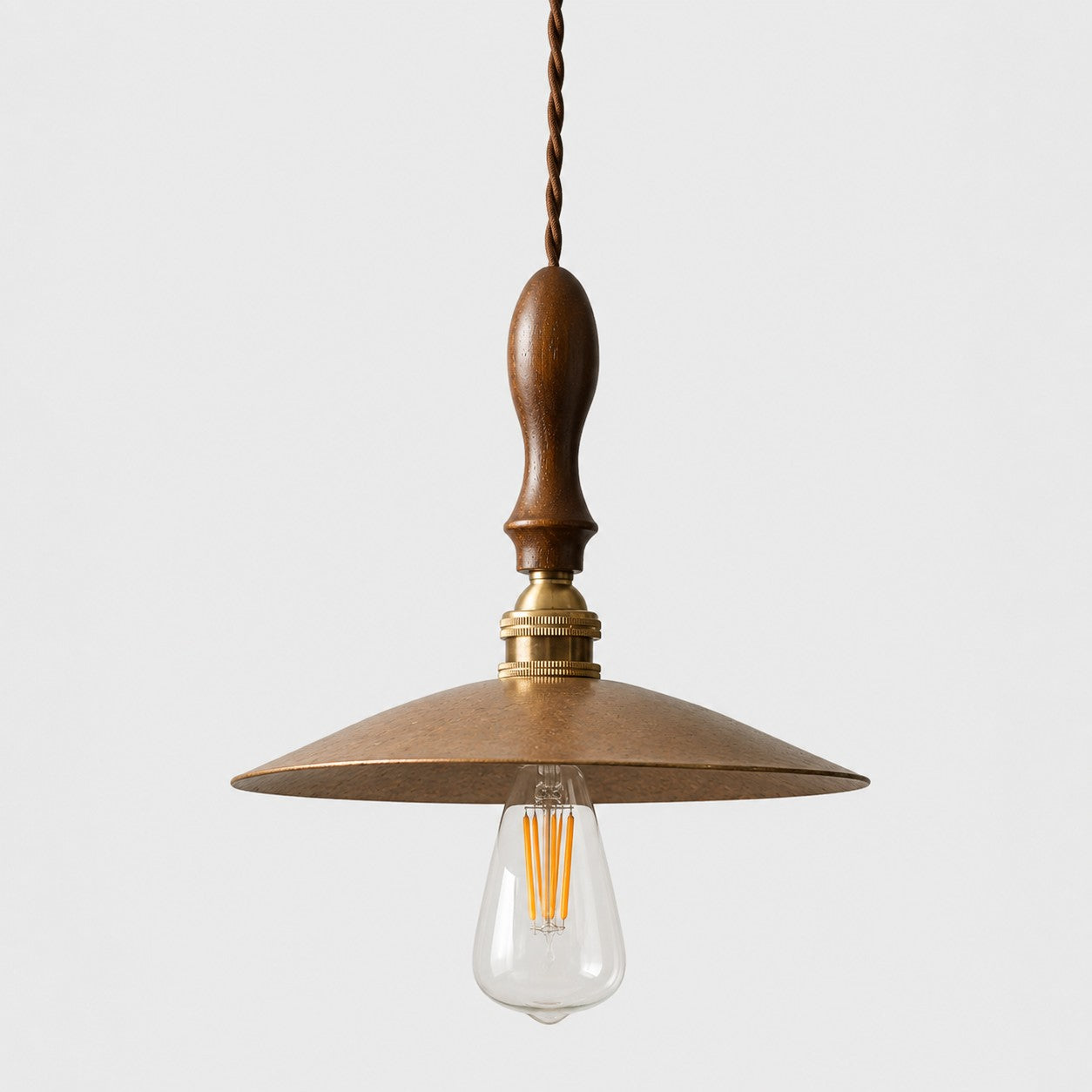 Hammered brass pendant with walnut wood on white background