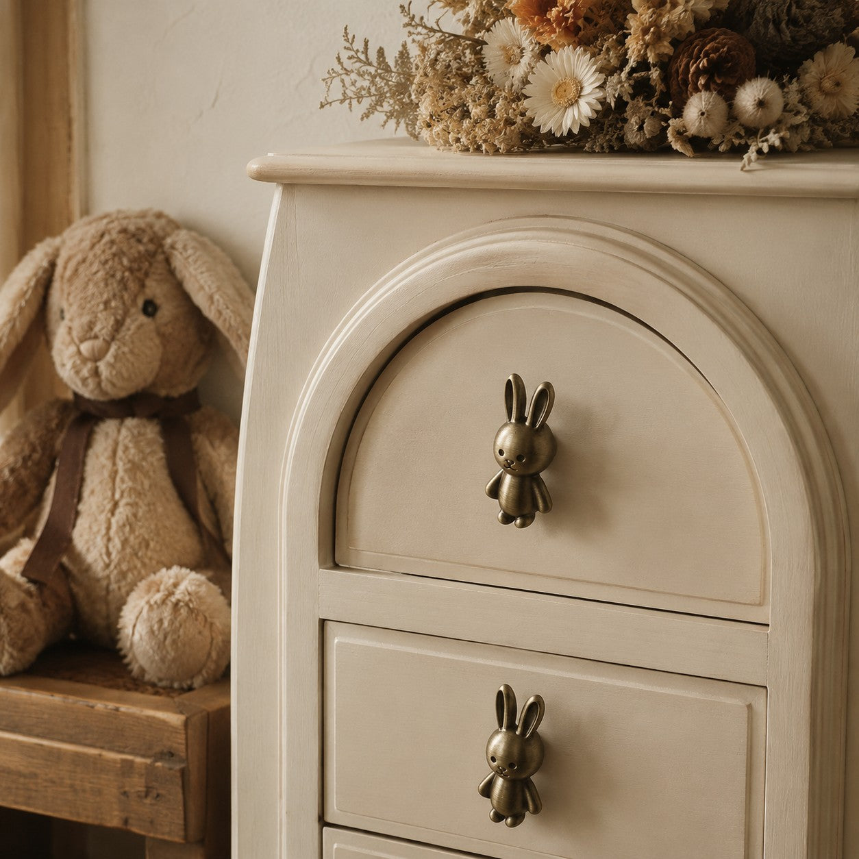 Rabbit cabinet knobs on nursery dresser drawers