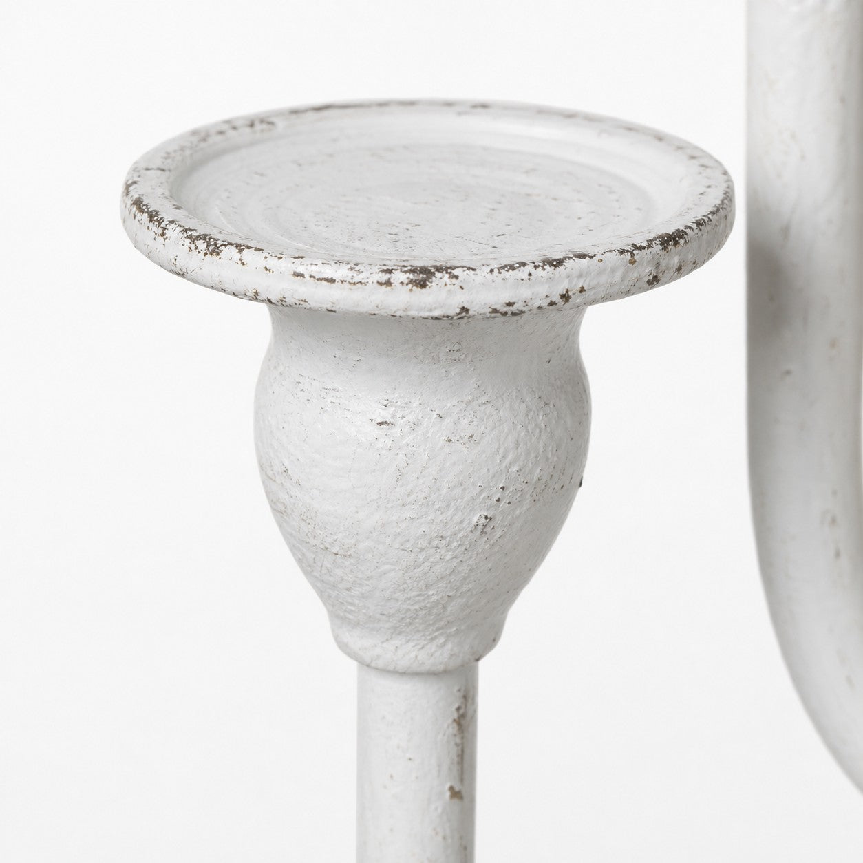 Close view of ivory branch candle cup and distressed finish