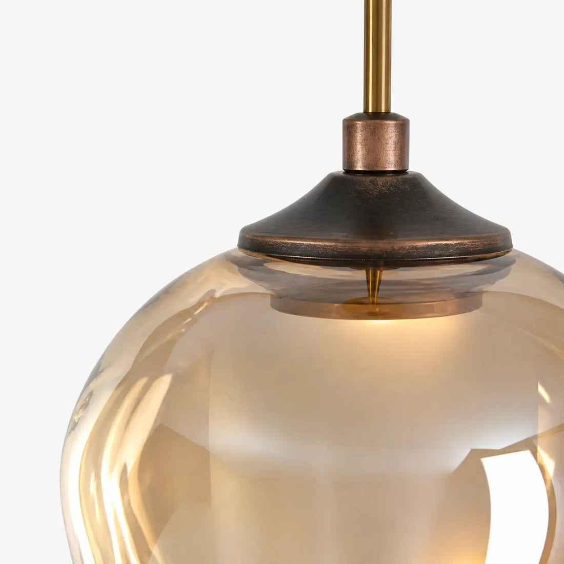Close view of the shade connection and metal fitting