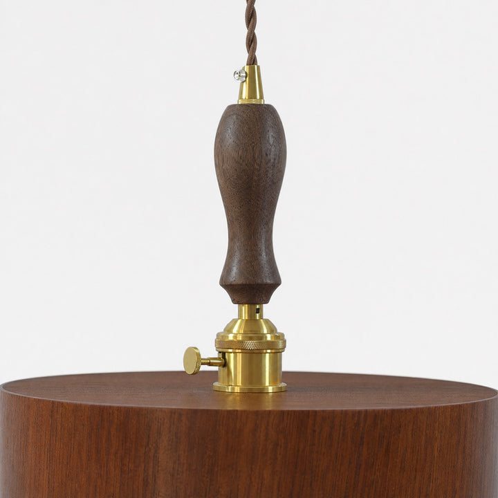 Turned dark wood suspension grip and brass-tone pendant hardware