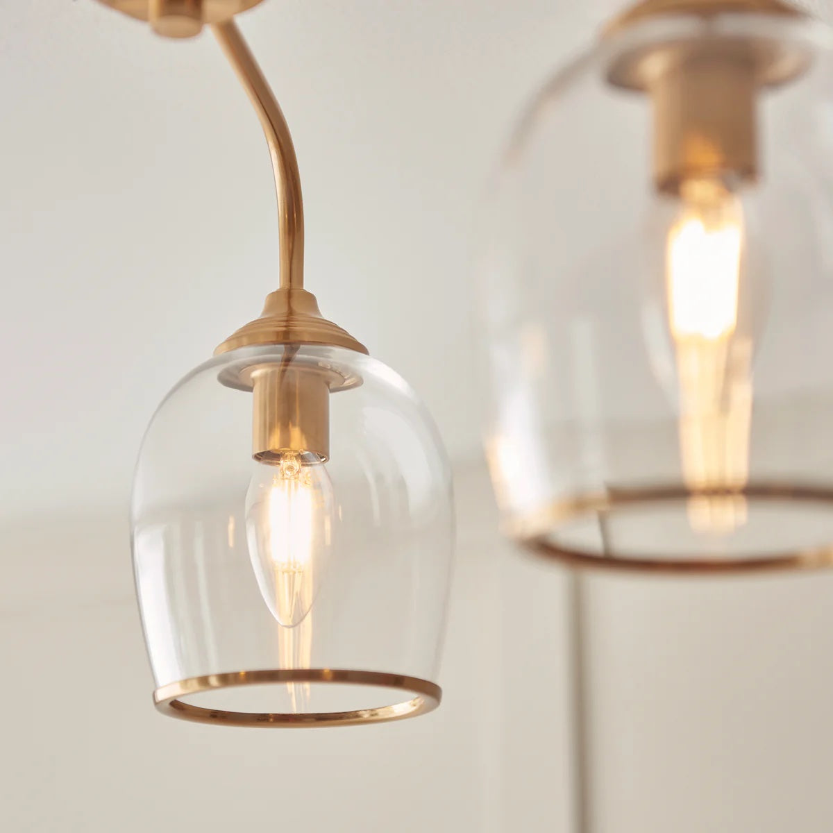 Brazara Multi-Light Glass Shade Pendant Lamp – Curved Metal Arms for Modern Homes