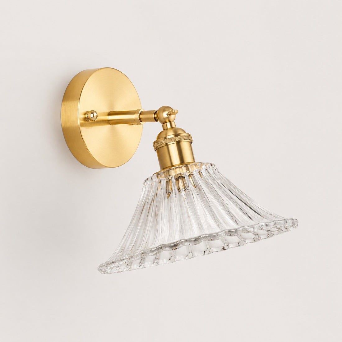 High clear shallow glass wall light with brass arm, IZ shade 6 cm high and 18 cm diameter