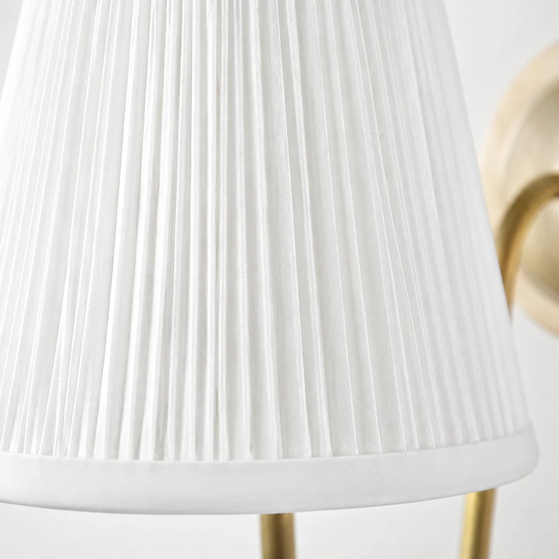 Close-up of the white pleated fabric shade