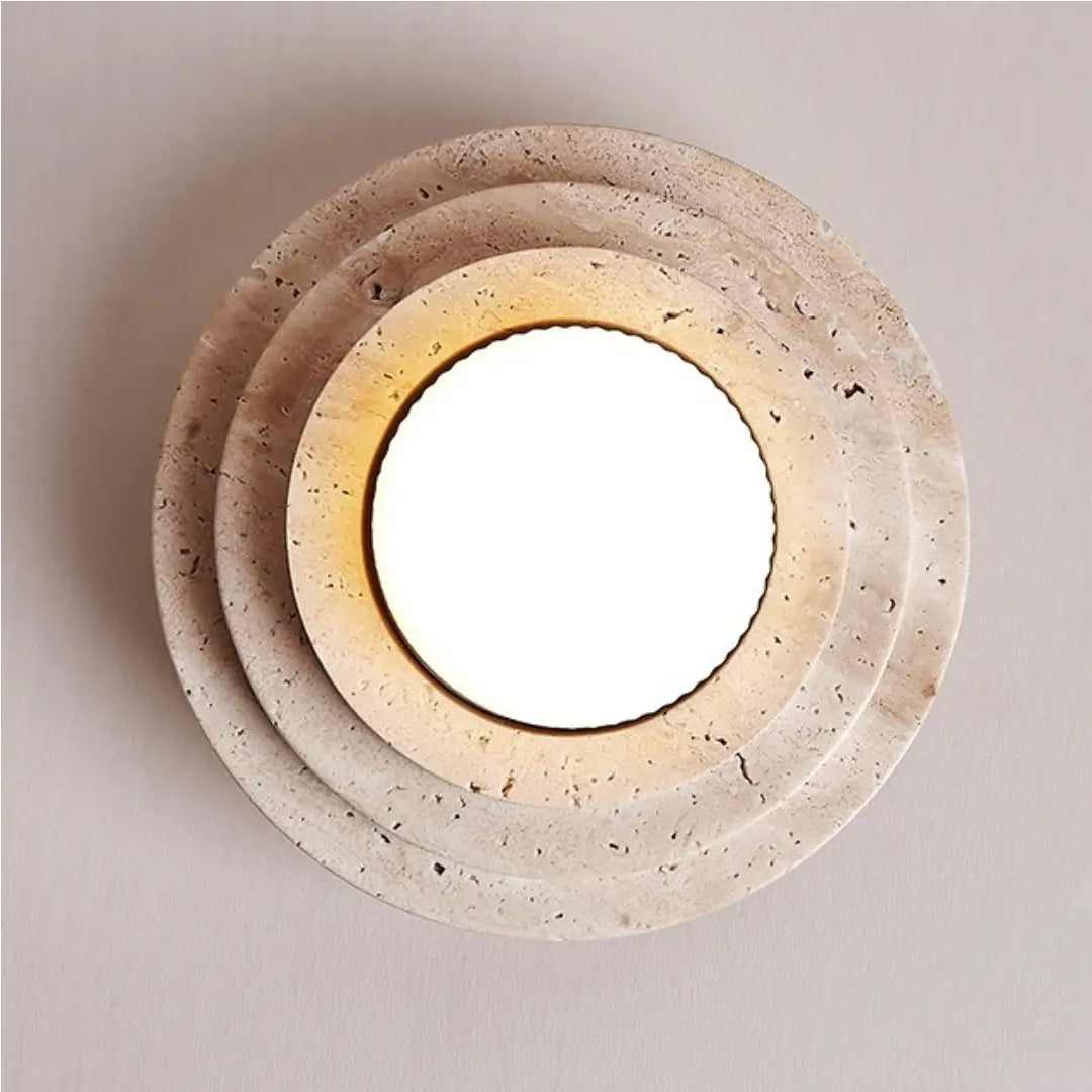 Front detail of the layered beige travertine ceiling light