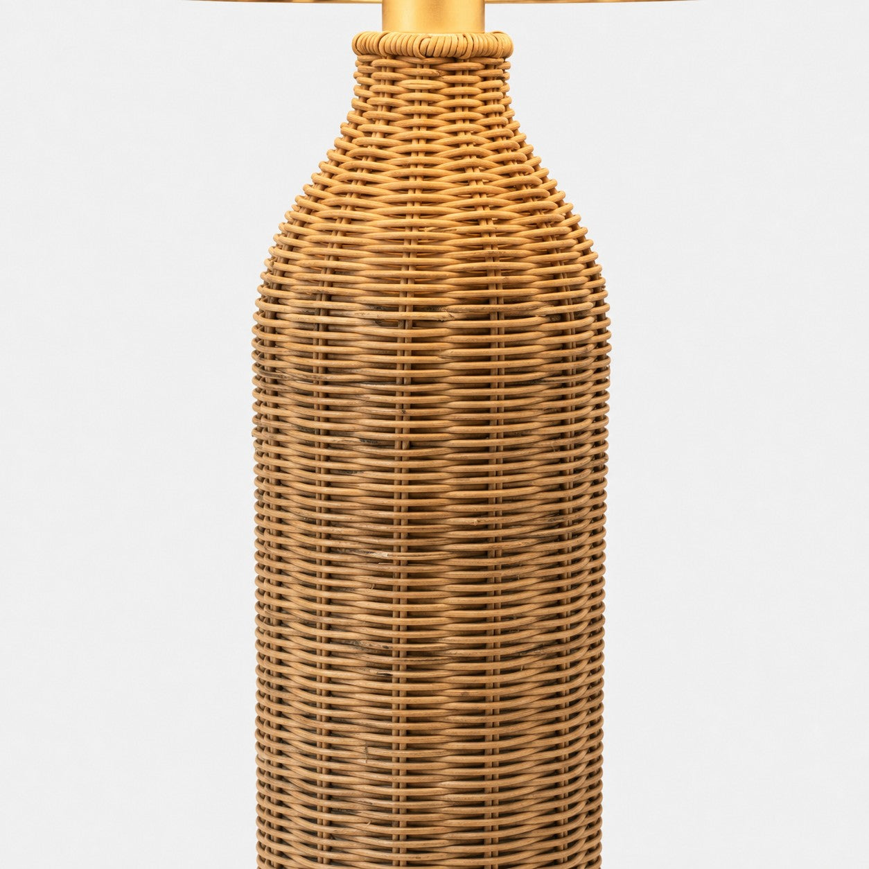 Woven rattan neck and metal lamp fitting detail