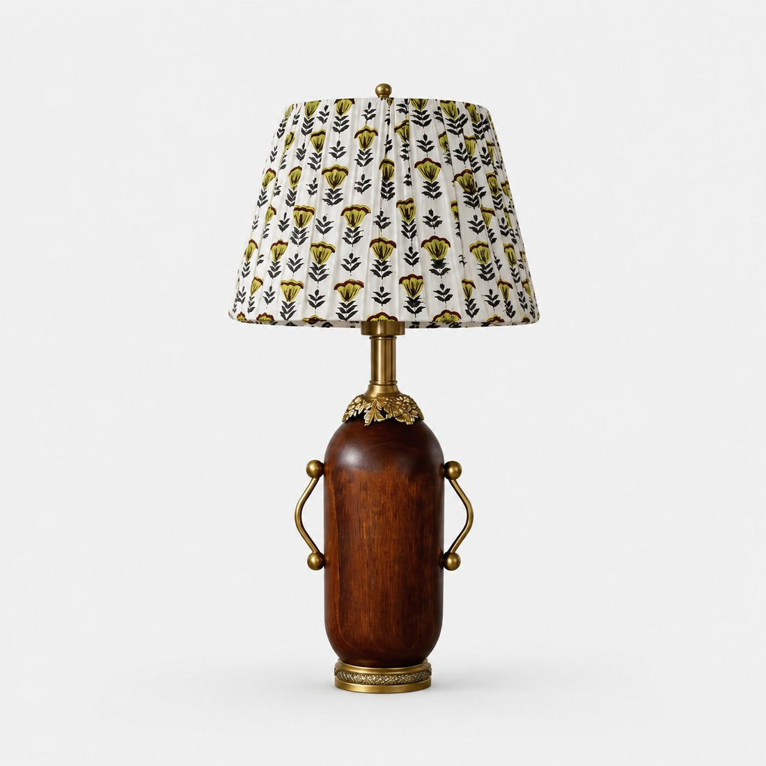 Deep brown vintage table lamp with yellow floral pleated shade on white background
