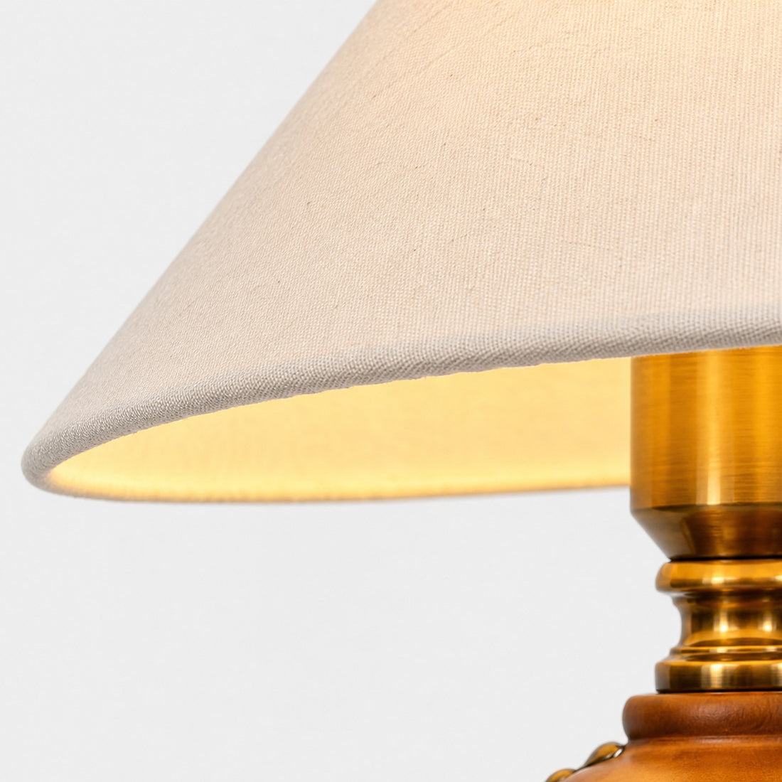 Off-white textured shade and brass-tone fitting
