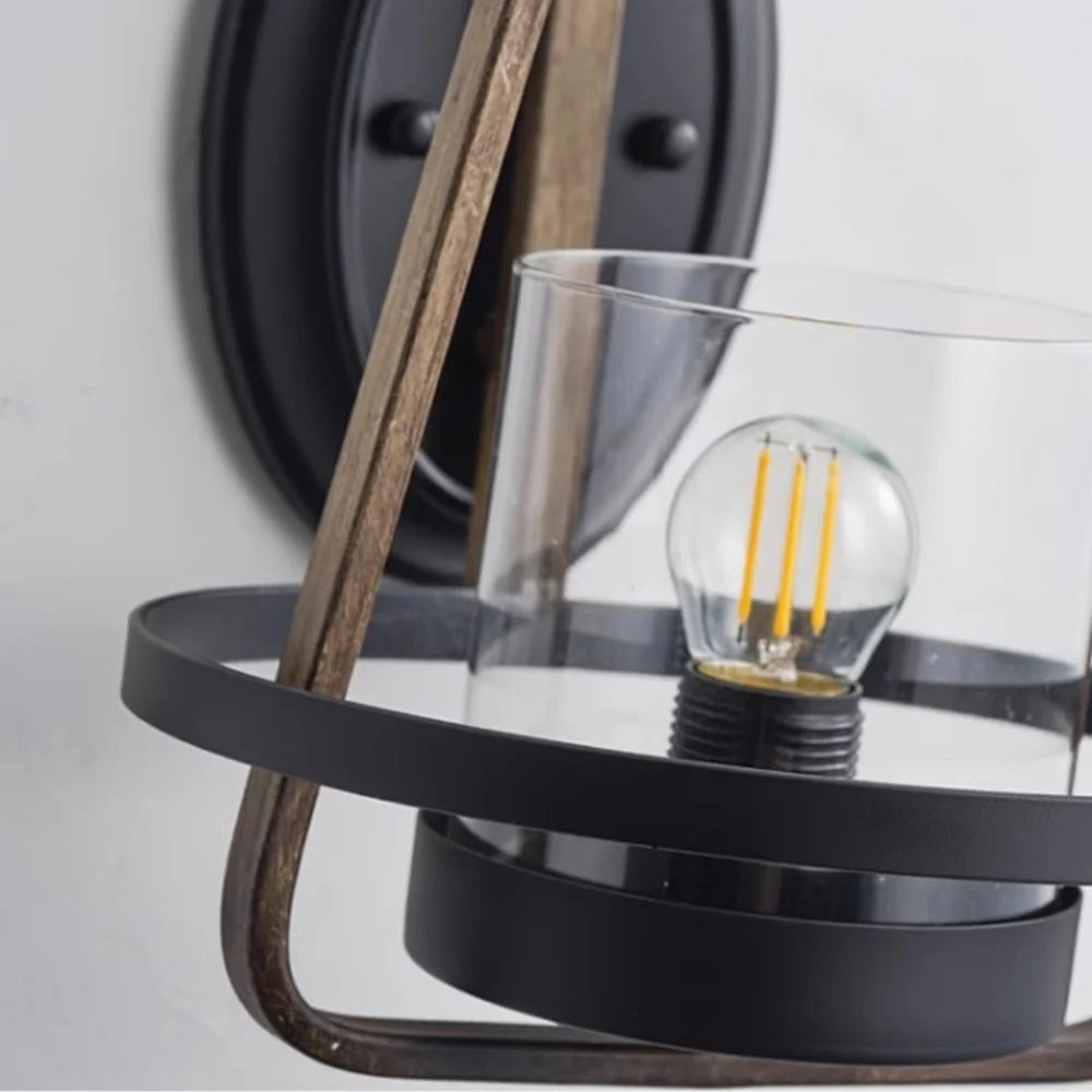 Clear glass shade and black metal lower ring detail