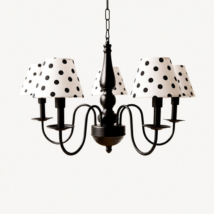 Five-light black chandelier with cream polka dot fabric shades