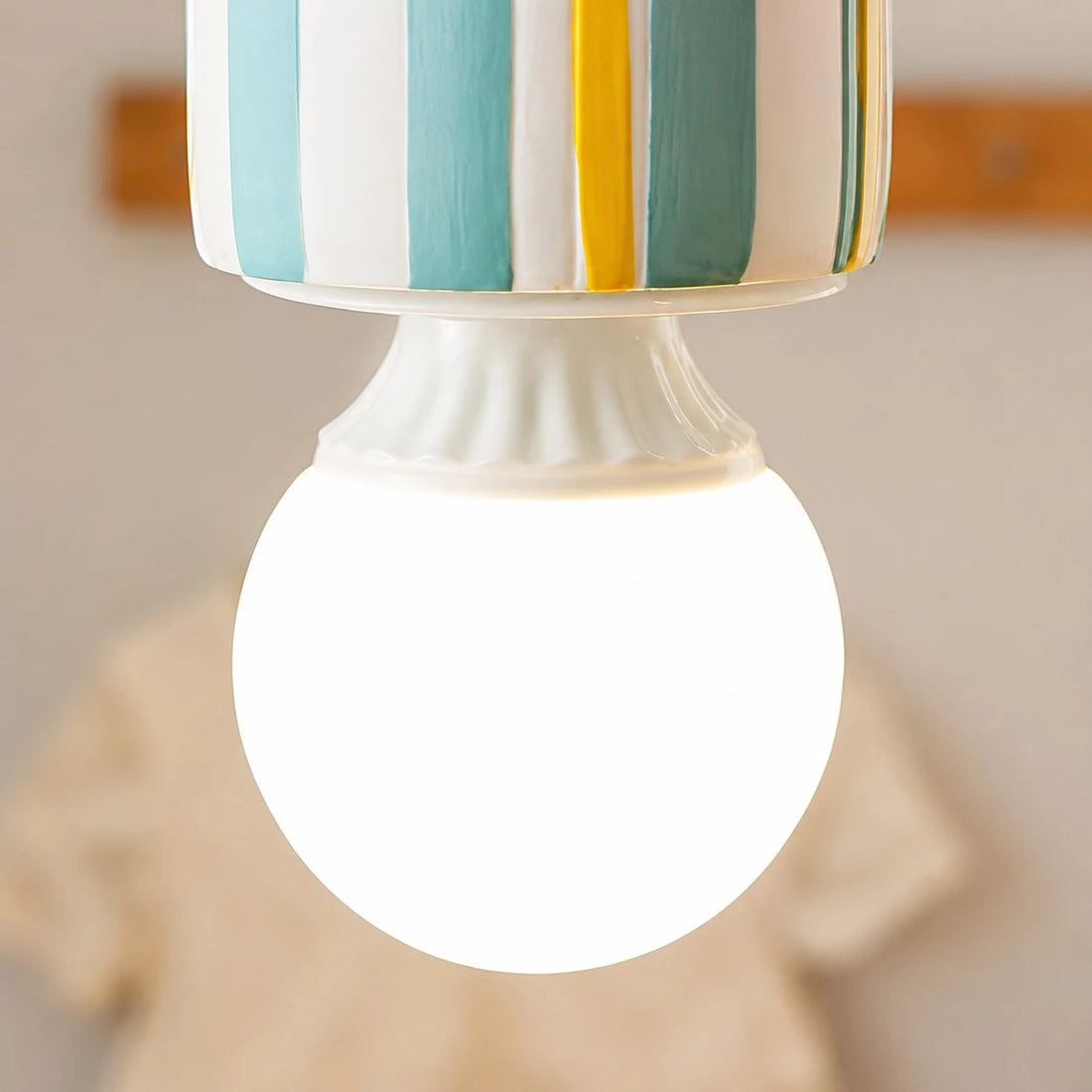 Gift box shade edge and bulb socket detail