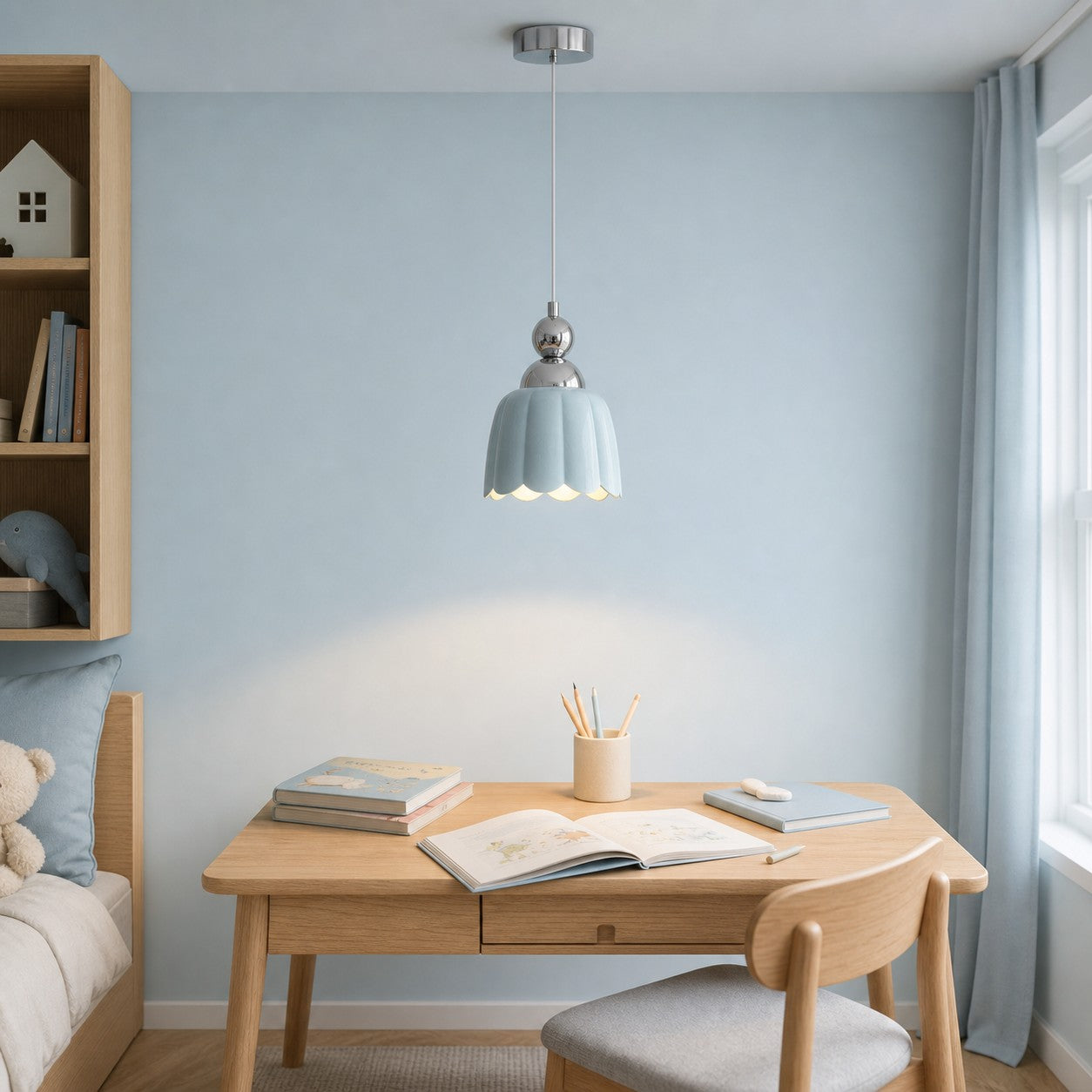 Sea salt blue ceramic pendant lamp above a study desk