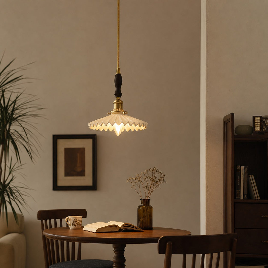 Walnut accent ceramic pendant light in a reading corner