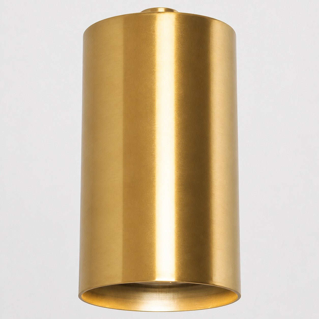 Brushed brass cylindrical shade detail