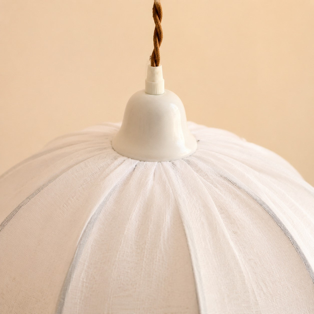 Pleated fabric shade and upper fitting detail