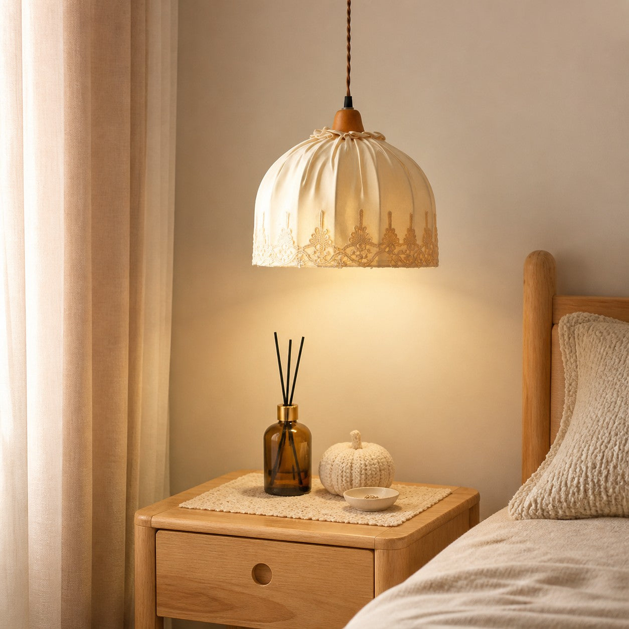 Vintage lace fabric pendant light in a bedroom