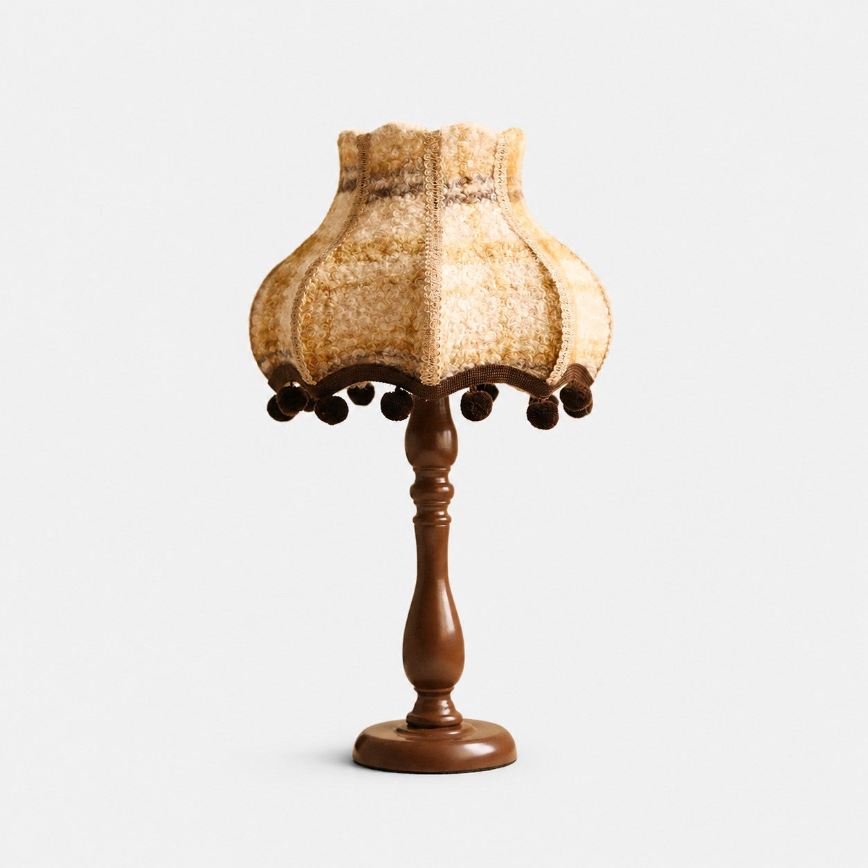 Vintage cream floral fabric table lamp on white background