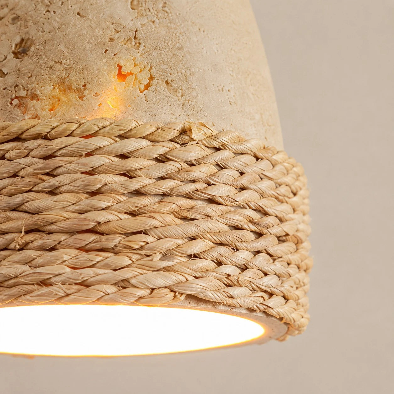 Close-up of stone texture and woven lower band pendant detail