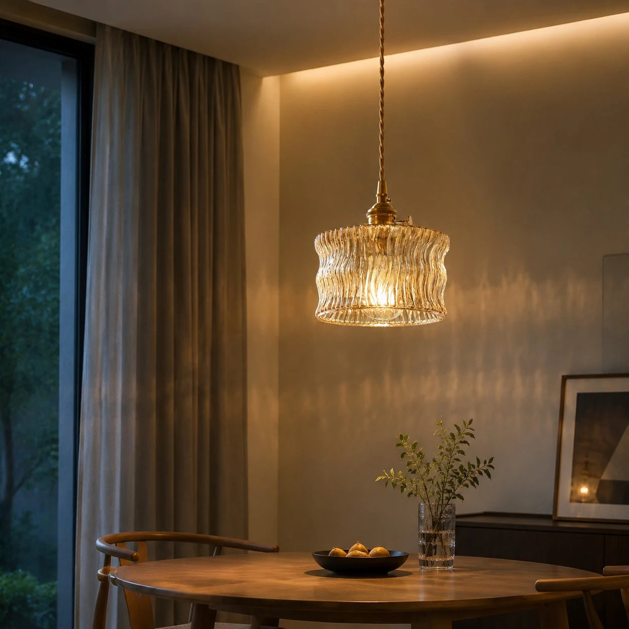 Amber ripple glass pendant in a warm lounge corner