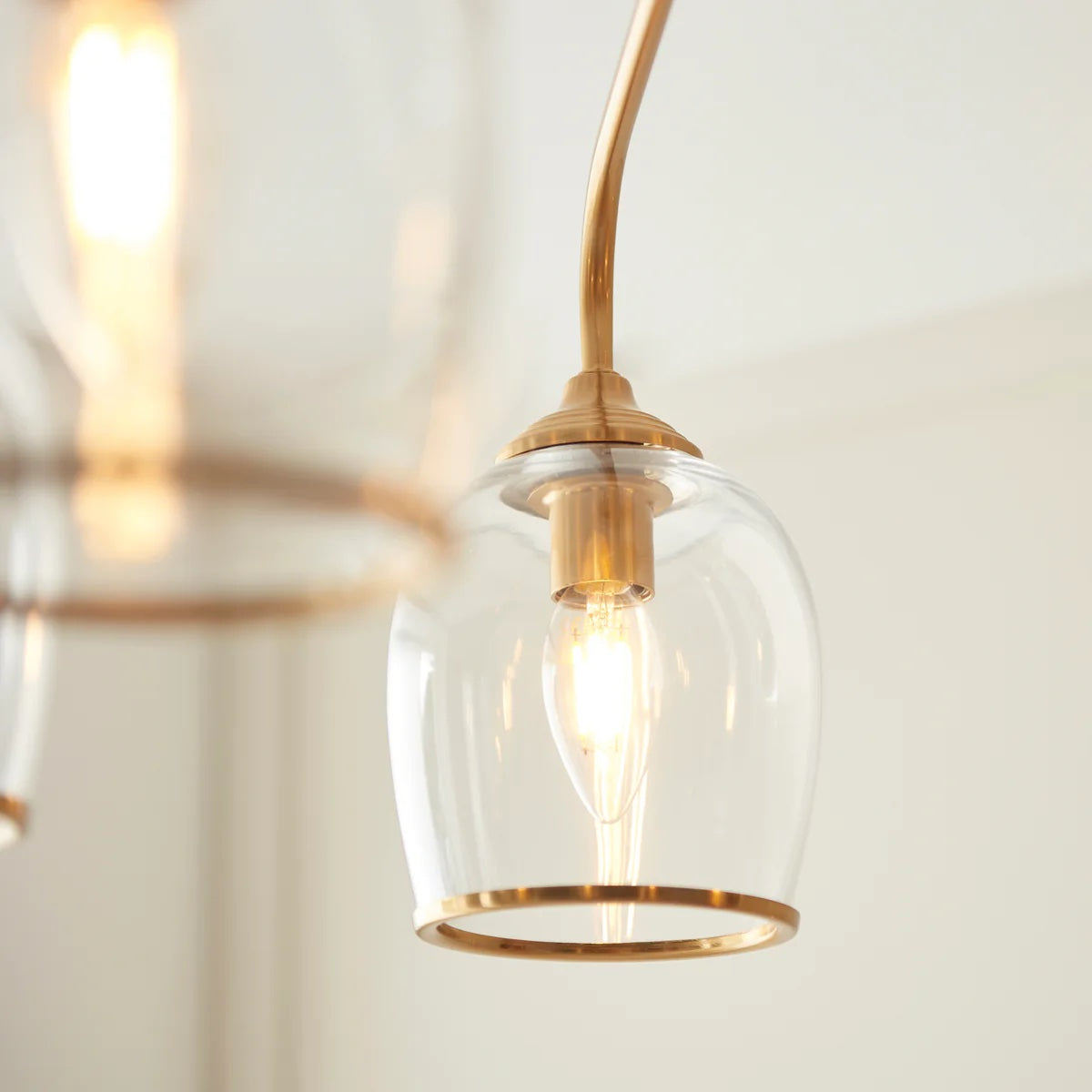 Brazara Multi-Light Glass Shade Pendant Lamp – Curved Metal Arms for Modern Homes