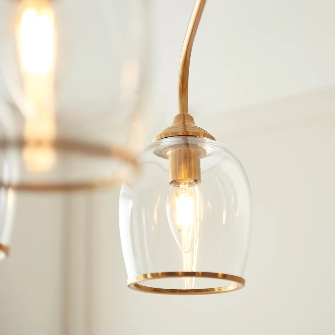 Brazara Multi-Light Glass Shade Pendant Lamp – Curved Metal Arms for Modern Homes