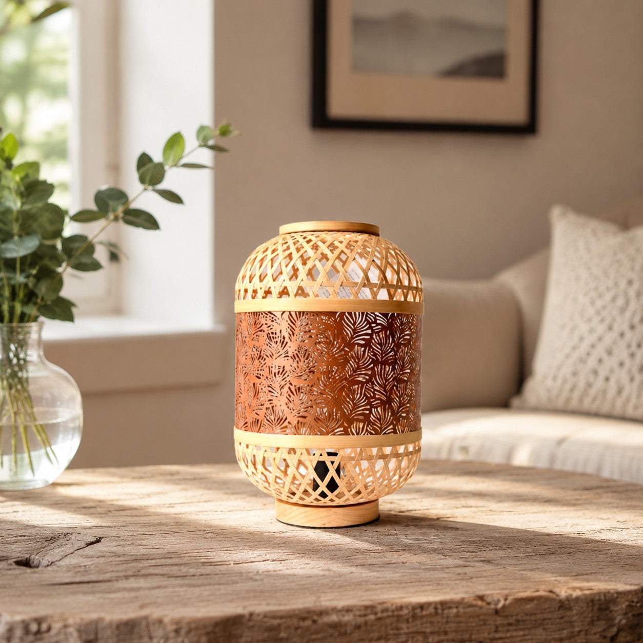 orange woven LED table lamp styled beside a sofa