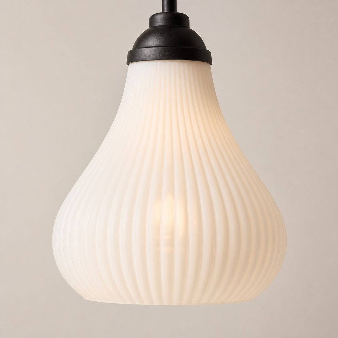 Close view of ribbed glass chandelier shade