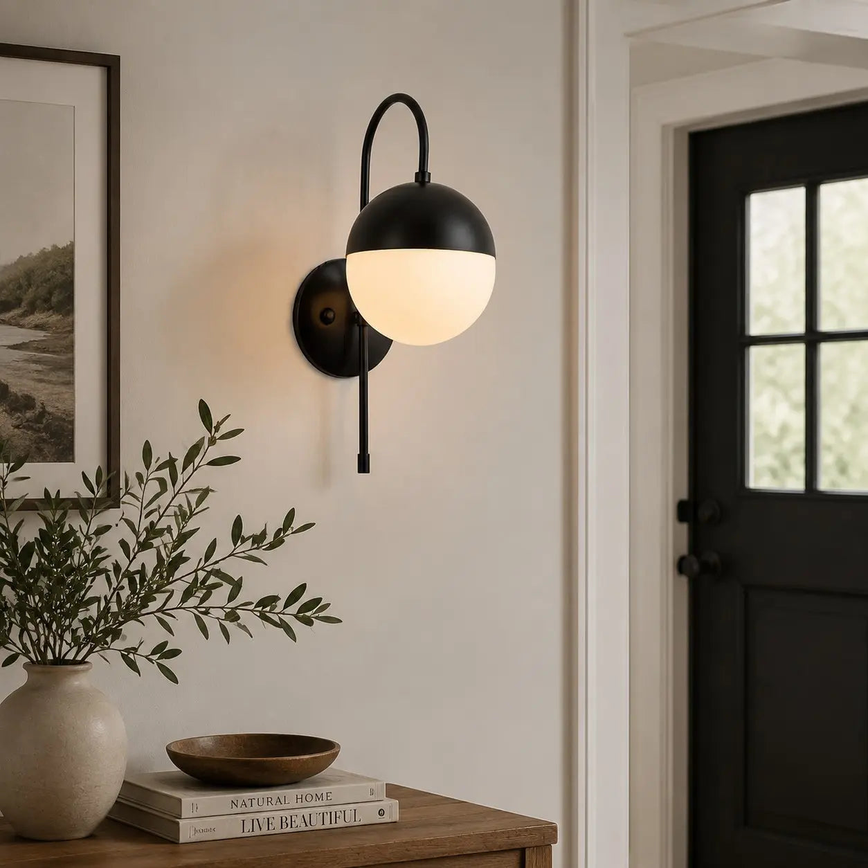 Black milk glass wall lamp in a hallway