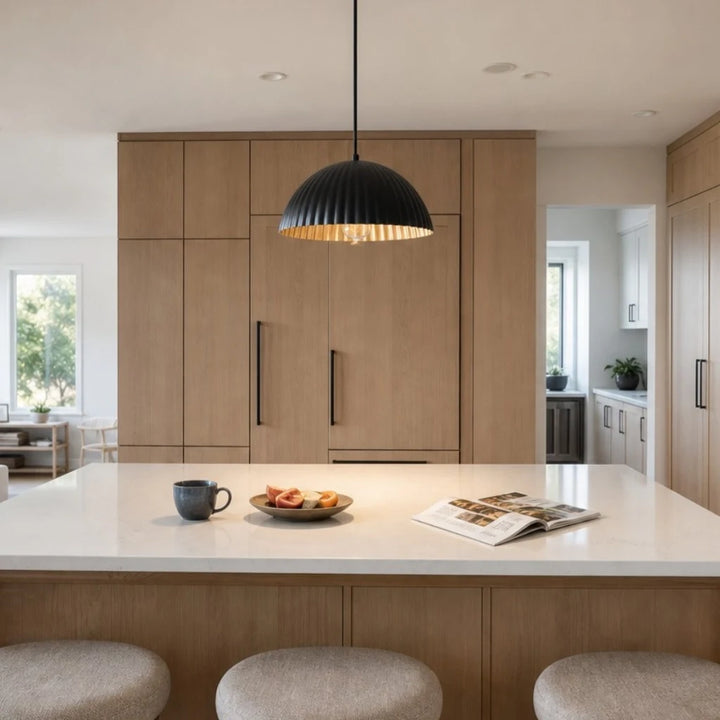 Black metal pendant lamp over a kitchen island