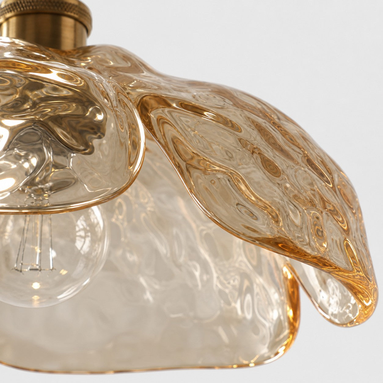 Close-up of amber pressed-glass flower texture
