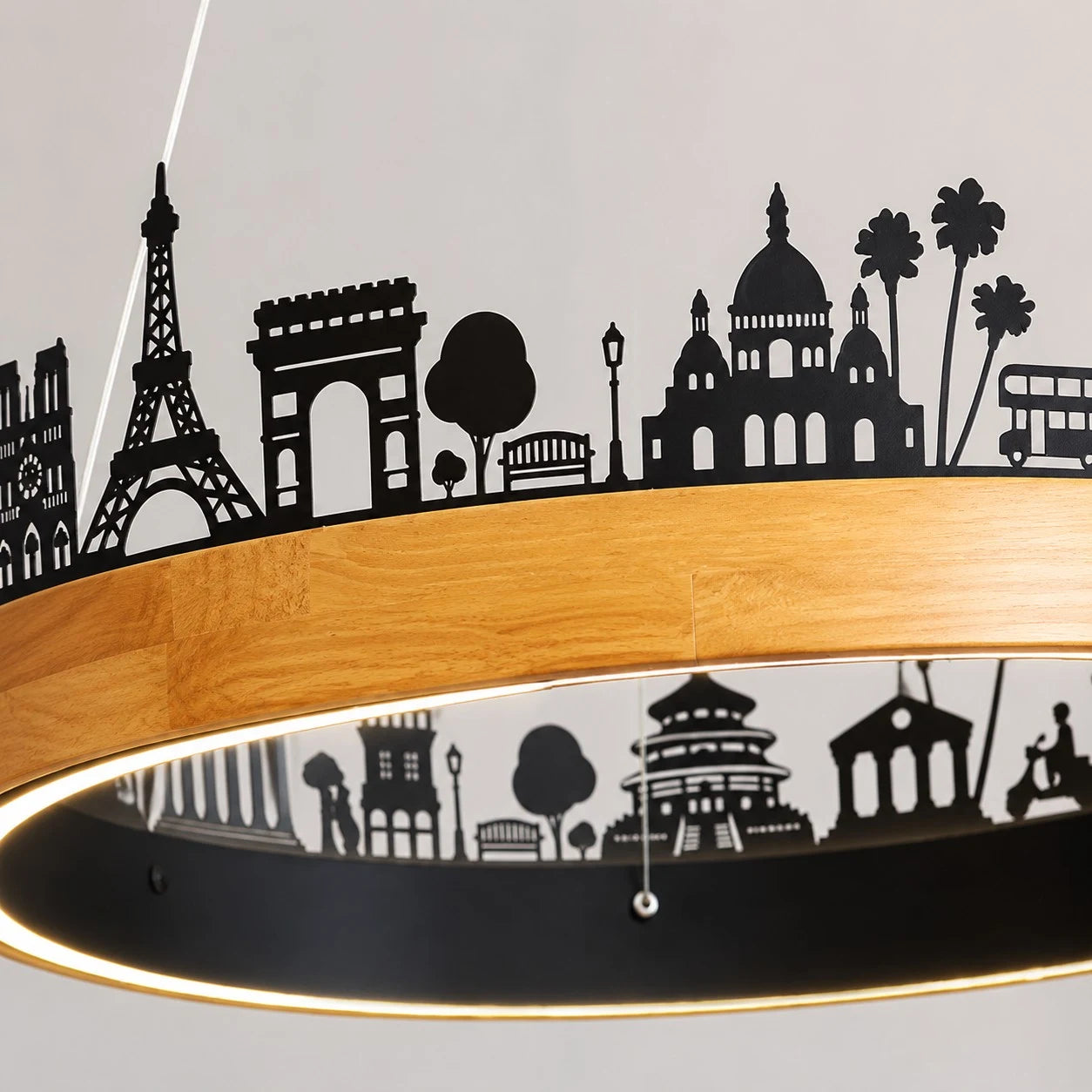 Close-up of the city skyline silhouette and wood ring