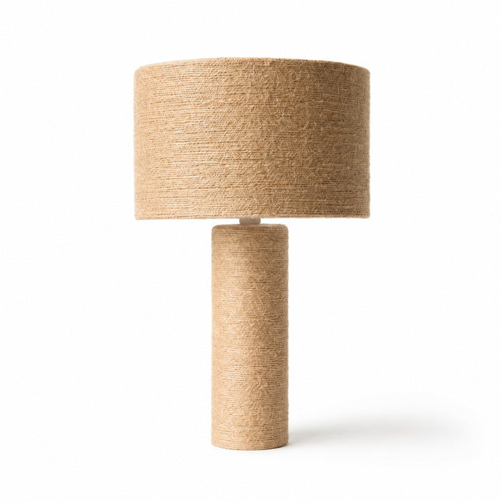 Woven jute cylinder table lamp on a white background