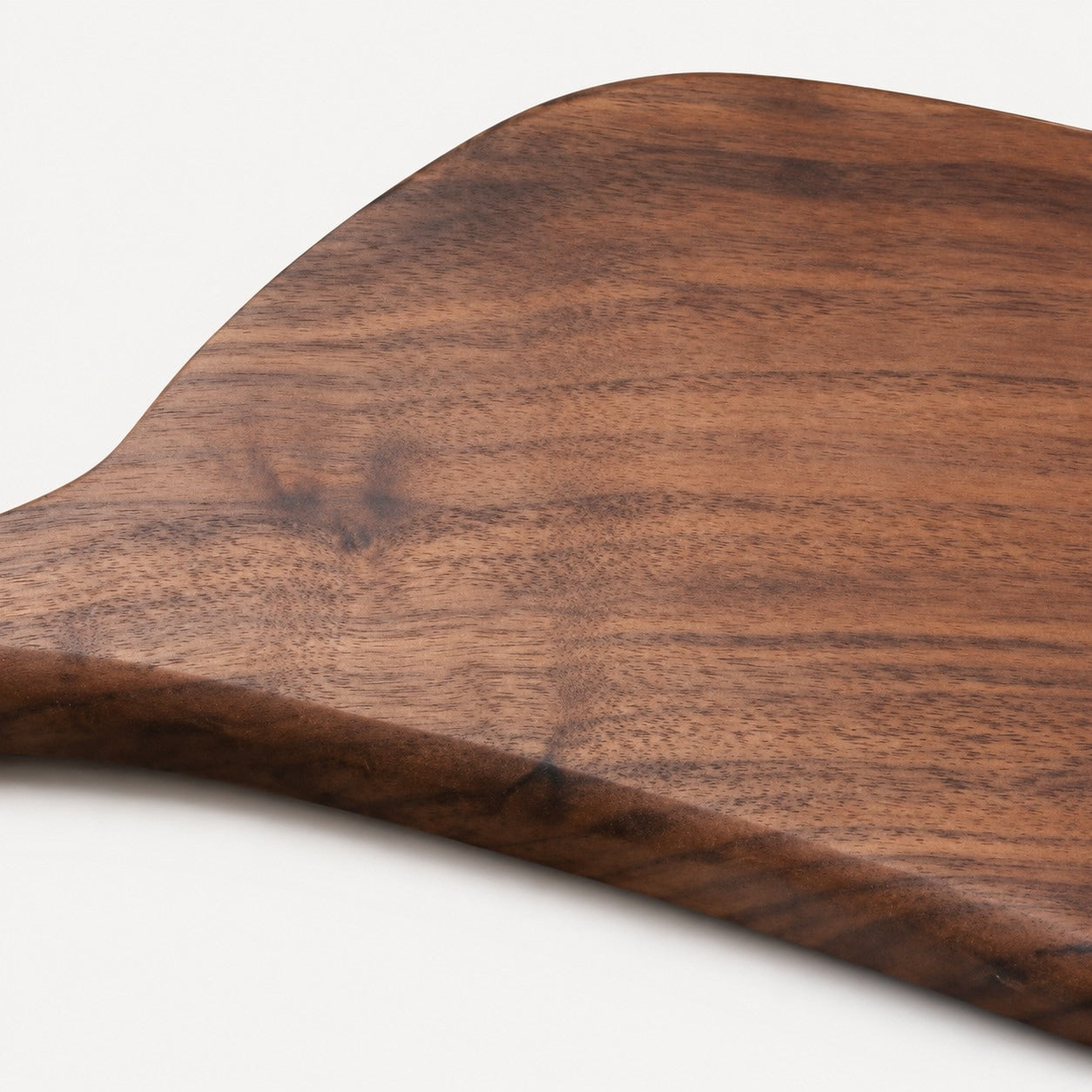 Detail: walnut grain and beveled edge