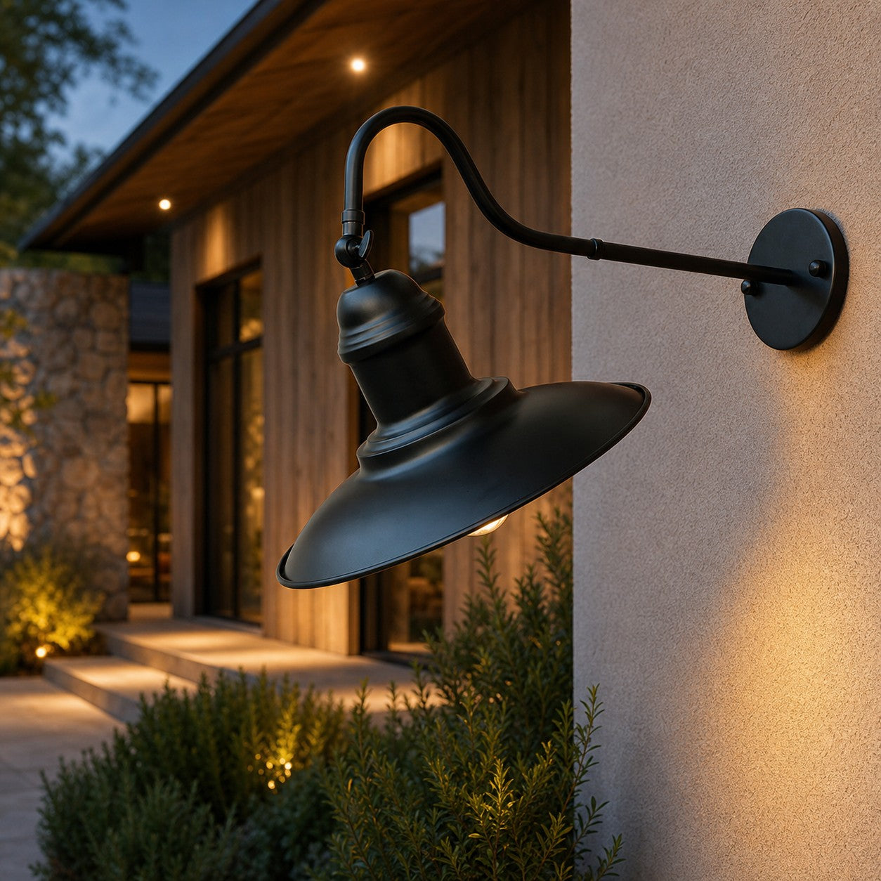 Black outdoor wall sconce installed on a sheltered exterior wall