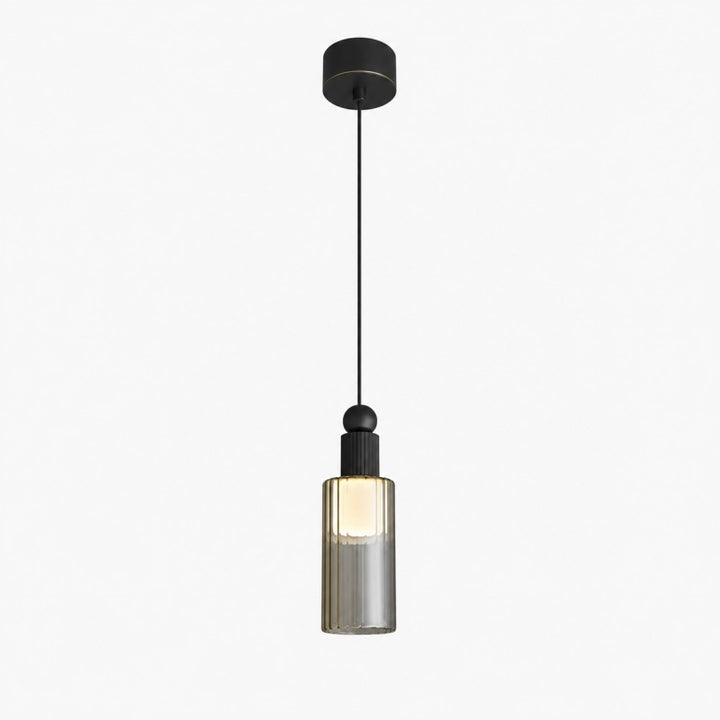 Single natural copper mini pendant by a kitchen window