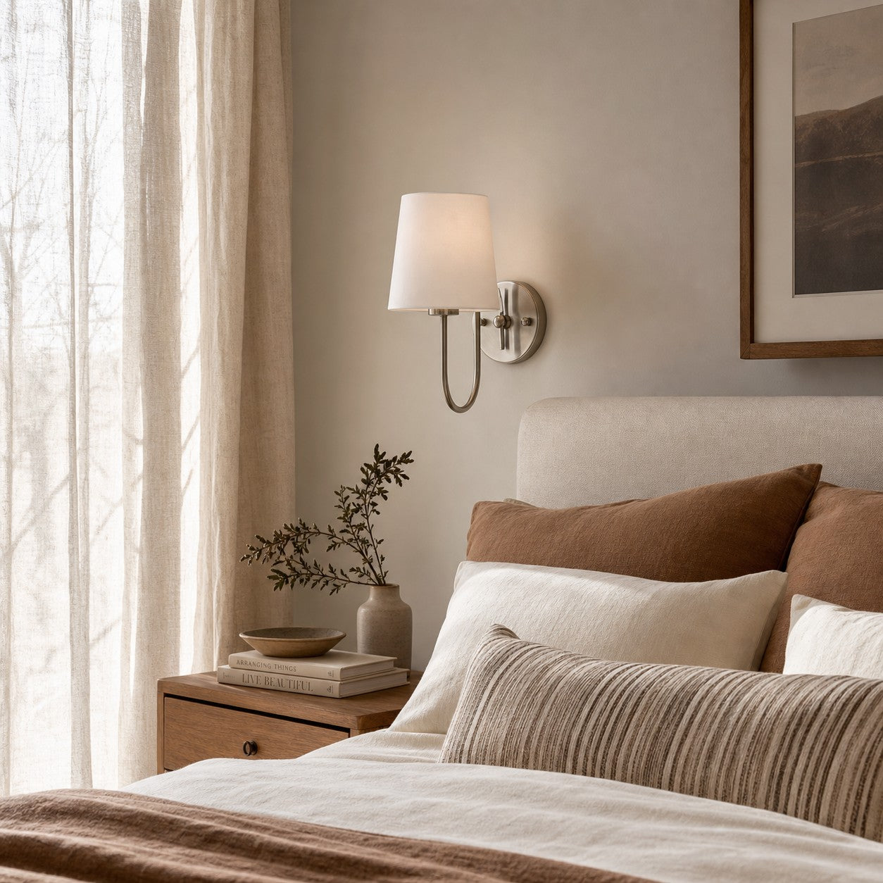 French style wall sconce in a soft bedroom setting