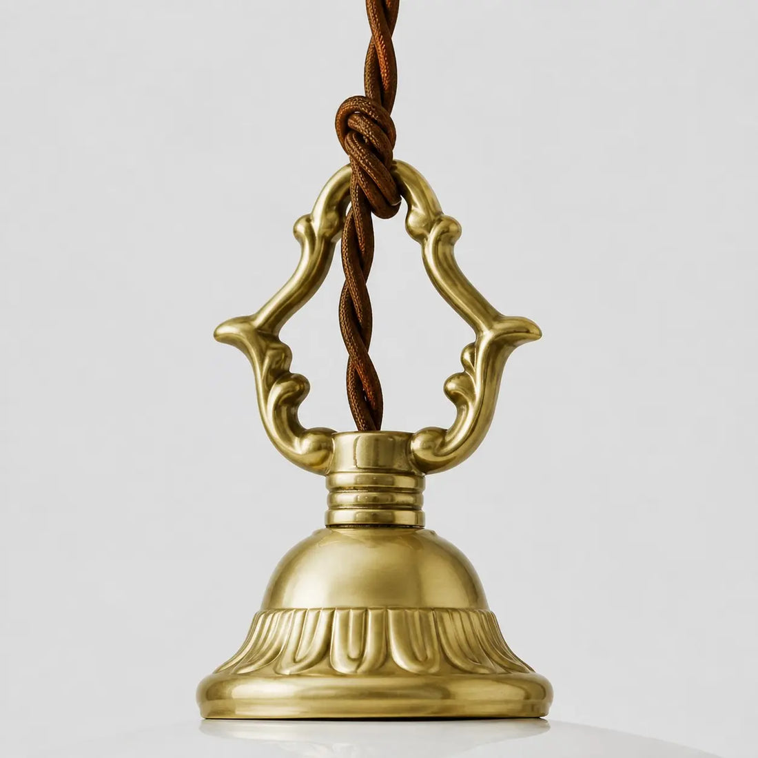 Antique brass ceiling hardware and adjustable cord detail