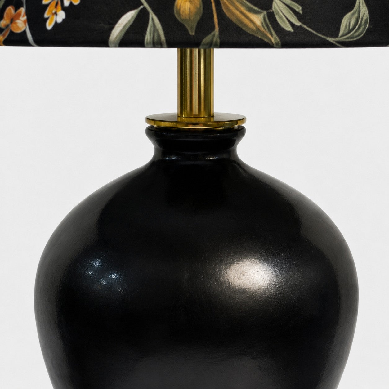 Close view of table lamp neck and base