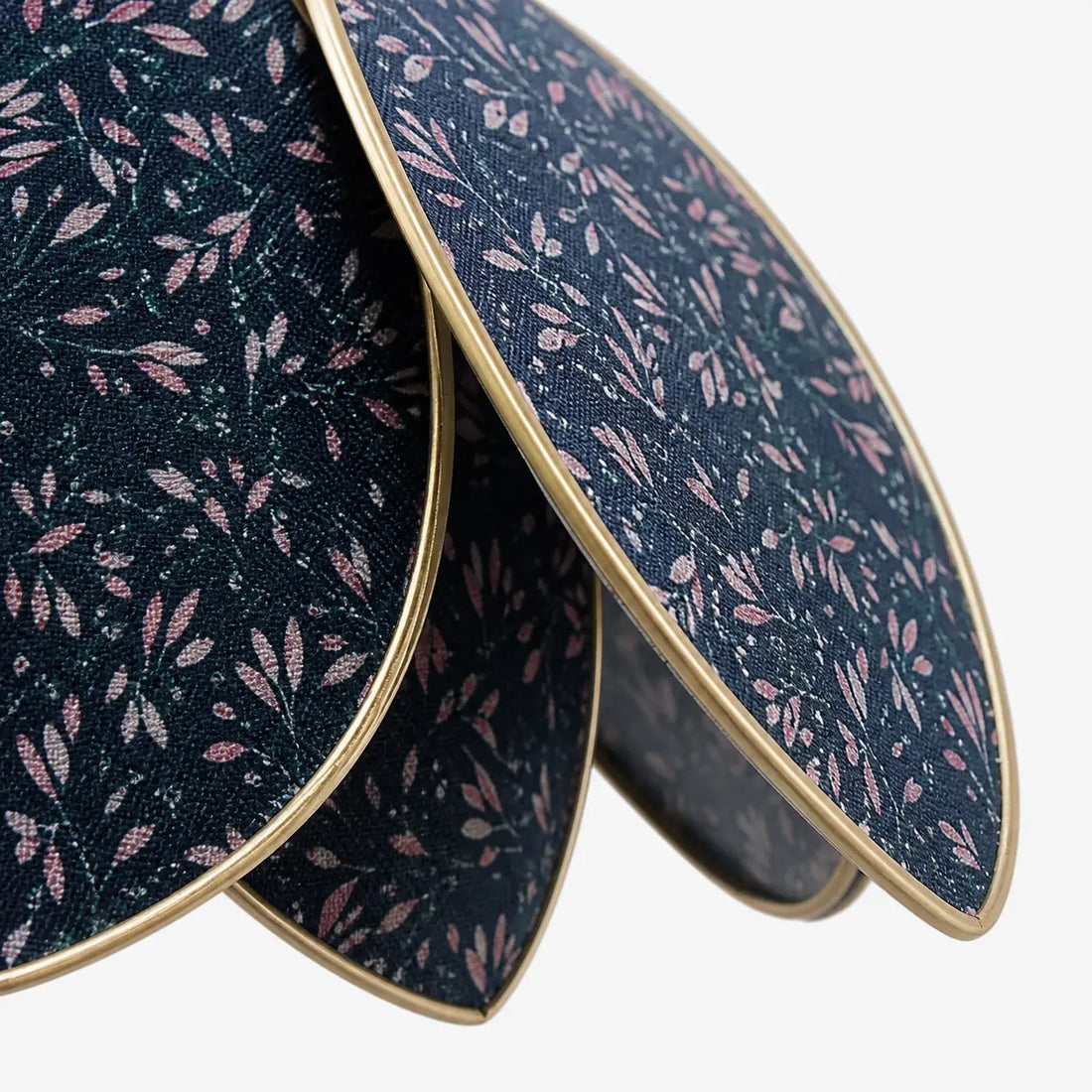 Close view of the floral fabric and metal trim